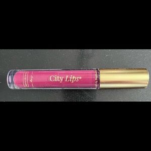 City Lips plumping lip gloss, unopened. MULBERRY … too dark for me ;(